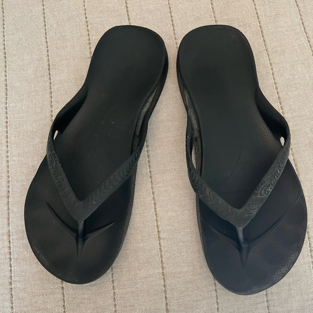 Archie’s flip flops